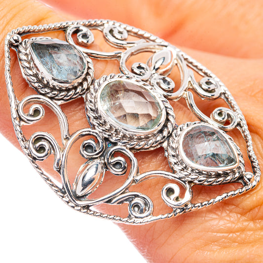 Sterling silver aquamarine ring with oval blue stones in ornate filigree setting