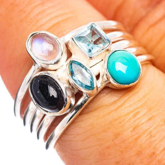 Sterling silver multi-stone ring with turquoise oval, black round, and blue square gems