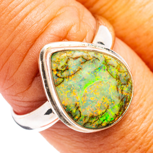 Oval green opal gemstone ring in .925 sterling silver setting