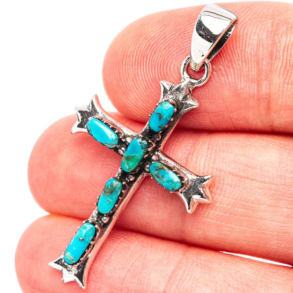Sterling silver cross earrings with turquoise gemstone clusters and star accents