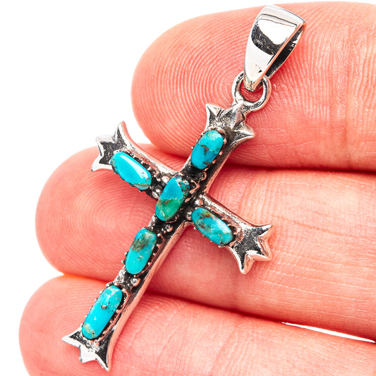 Sterling silver cross pendant with turquoise inlay stones and star accents
