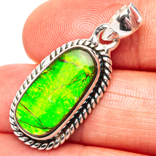 Sterling silver ammolite pendant with oval green iridescent gemstone, braided bezel