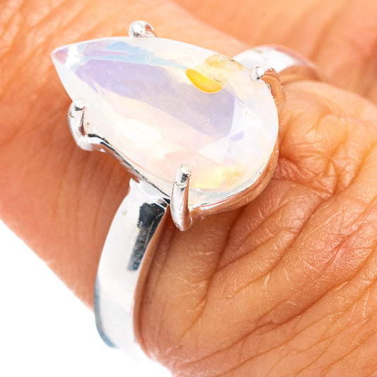 925 sterling silver opal ring with pear-shaped opal gemstone and prong setting
