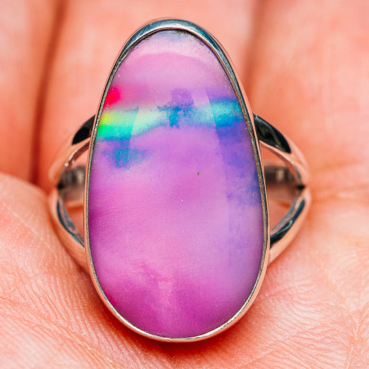 Teardrop opal ring front view, purple iridescent stone in sterling silver bezel