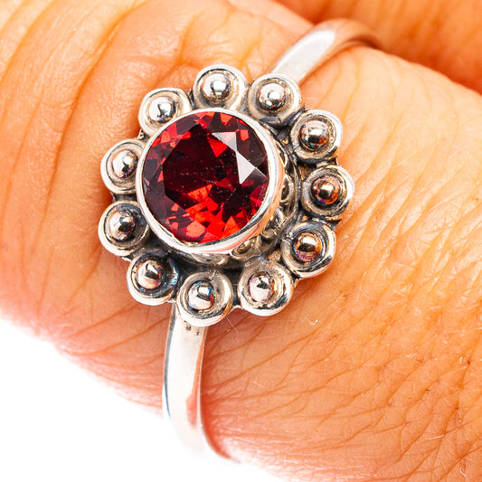 Garnet sterling silver ring with round red gemstone and halo of small bead settings