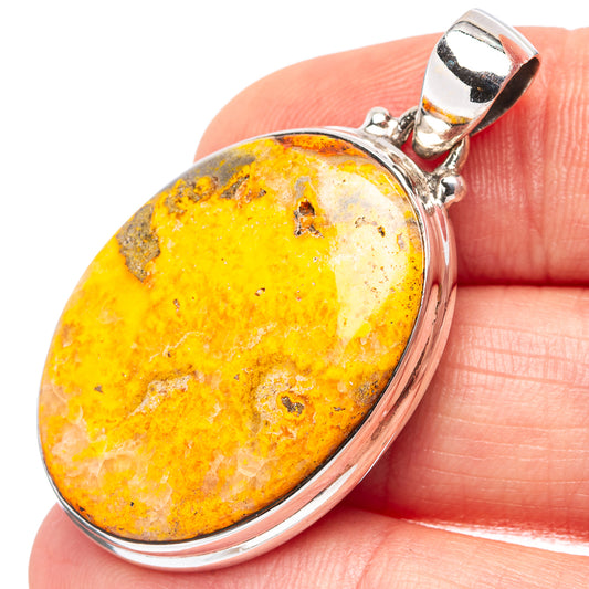 Sterling silver jasper pendant with oval yellow-orange stone and bezel frame