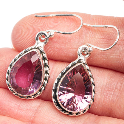 Silver teardrop earrings with faceted purple-to-blue gemstone and lever hook backs