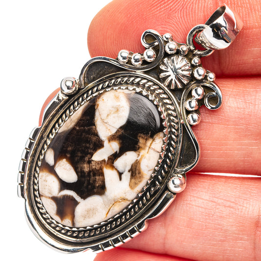Sterling silver jasper pendant with oval gemstone in ornate bezel, bead details