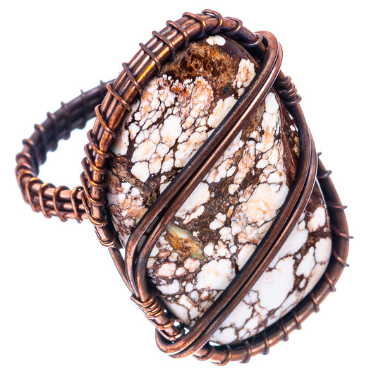 Oxidized copper wire-wrap ring with marbled white/brown jasper center, double band look.