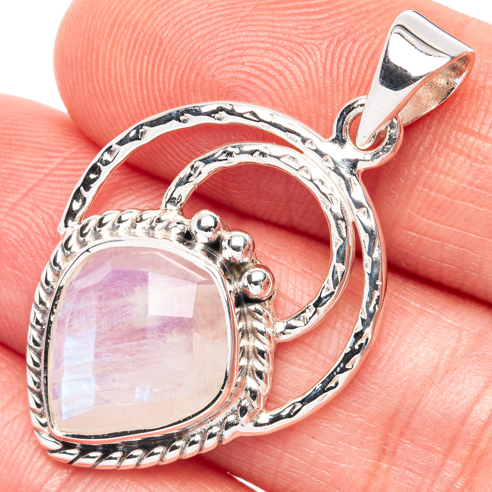 Sterling silver oval moonstone pendant with rainbow iridescent stone and ornate bezel