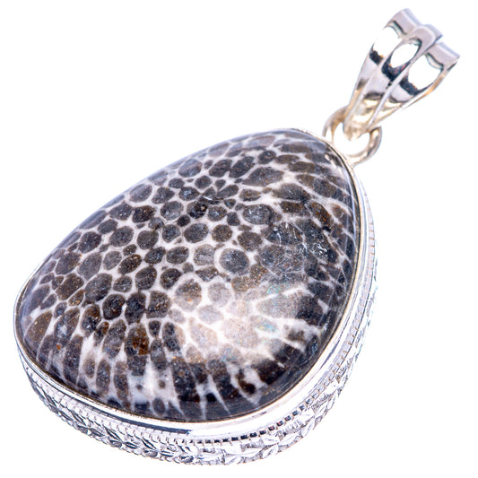 Sterling silver pendant with teardrop oval mottled gray-black stone, textured edge