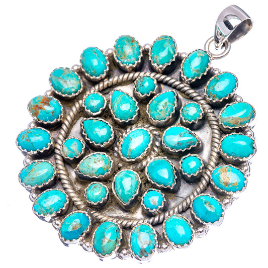 Round turquoise pendant with tightly set turquoise cabochons in silver rope border