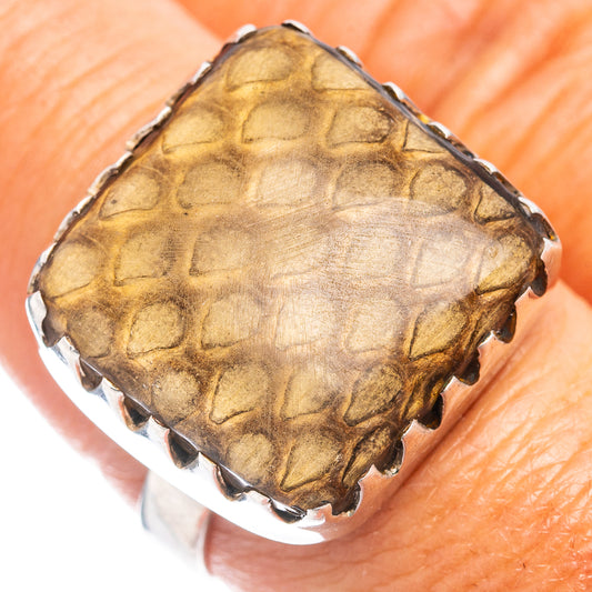 Sterling silver ring with gold-brown wood jasper cabochon and scalloped bezel setting