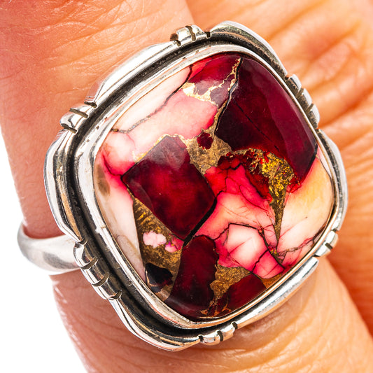Oval red and pink stone ring with gold speckled matrix set in sterling silver