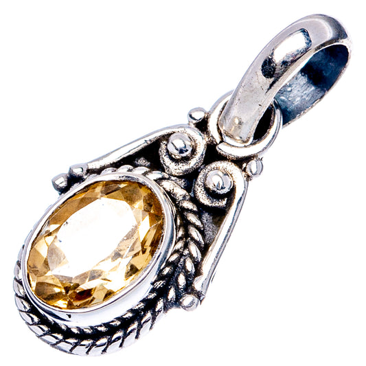 Oval citrine gemstone pendant with decorative silver setting and clasp bail