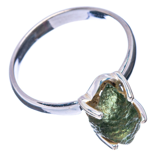 Sterling silver ring with rough green moldavite slice in three-prong setting