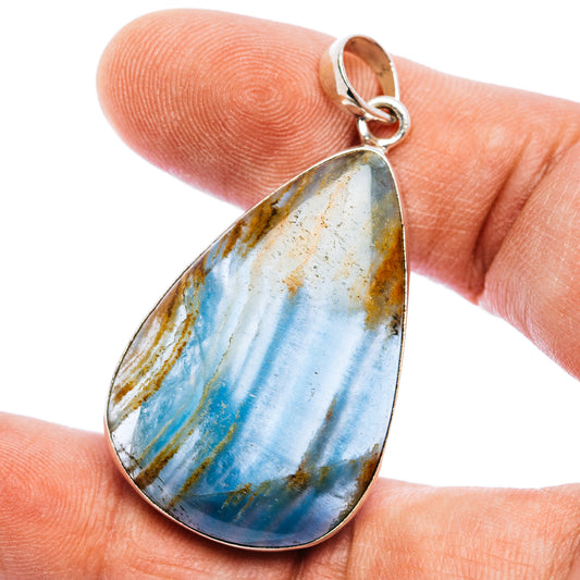 Aquatine blue calcite teardrop pendant with .925 sterling silver wire bail