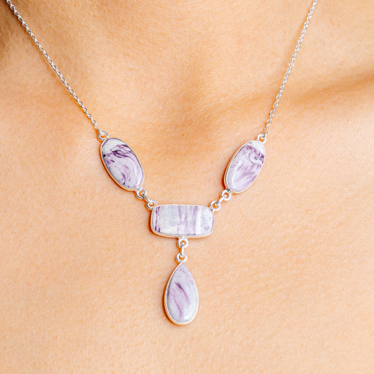 Kammererite sterling silver necklace with three oval and teardrop purple stones