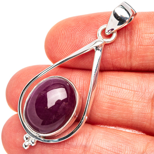 Teardrop sterling silver ruby pendant with round purple gemstone and bail loop