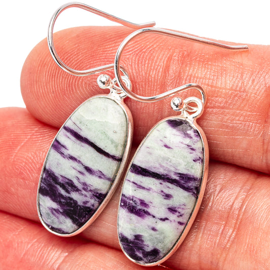 Sterling silver oval dangle earrings with purple and white stone panels