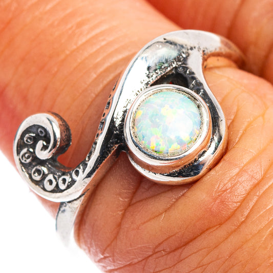 Sterling silver opal wave ring with round opal cabochon and engraved band