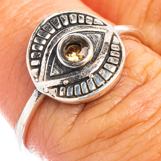 Sterling silver dainty eye ring with round citrine-colored gemstone and carved details