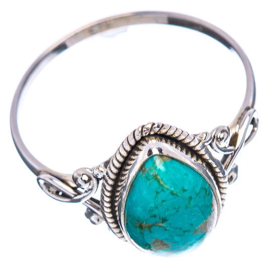 Sterling silver turquoise ring with oval cabochon, rope border, split band