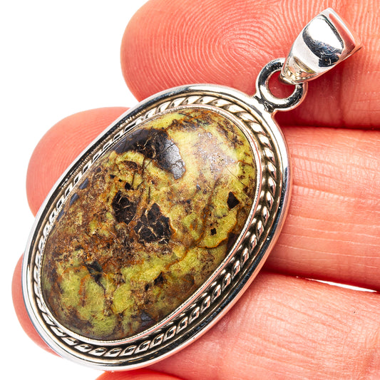 Oval gaspeite pendant in .925 sterling silver bezel, with scalloped rope edge