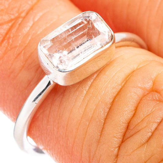 Close-up of sterling silver morganite ring with cushion-cut pink gemstone bezel