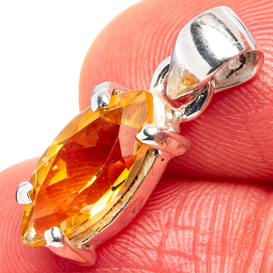 Sterling silver citrine pendant with faceted yellow stone and round loop bail, prong set