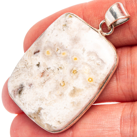Silver-plated rhodochrosite pendant, white marbled stone, top loop bail