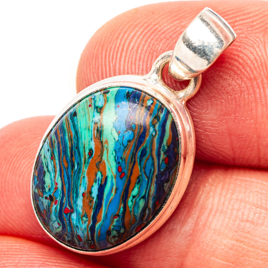 Oval rainbow calsilica pendant in silver bezel with bail, gemstone with blue and turquoise swirls