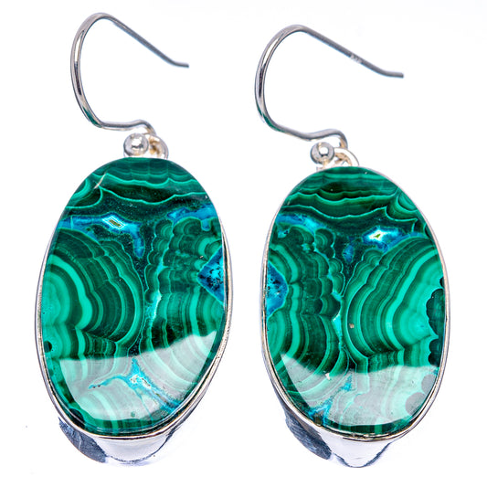 Silver-framed oval drop earrings with vivid green malachite banded pattern and teal highlights