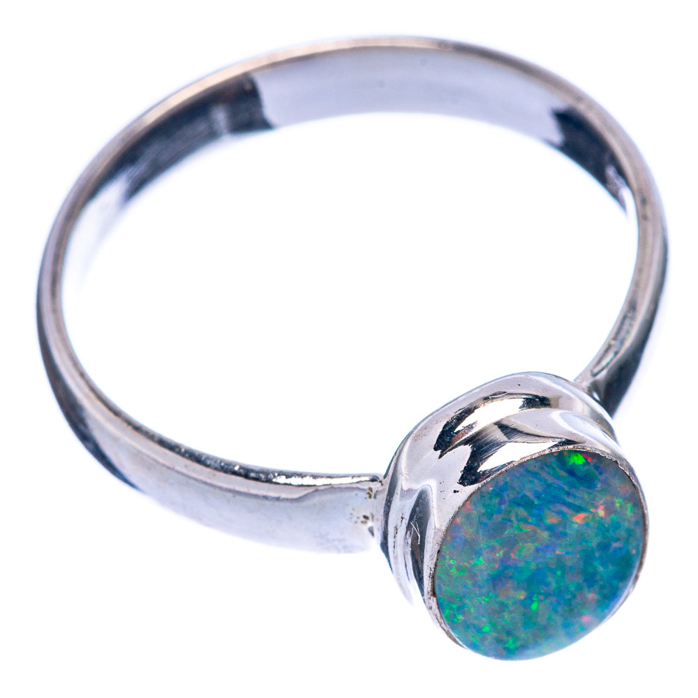Sterling silver ring with oval blue-green opal cabochon bezel set