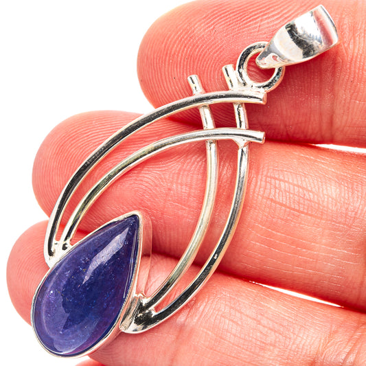 Sterling silver tanzanite pendant with teardrop blue gemstone and double curved hoops
