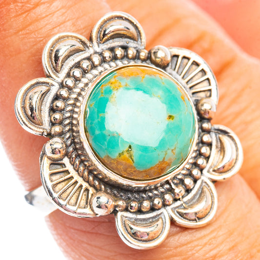 Turquoise oval cabochon sterling silver ring with detailed floral filigree, size 7