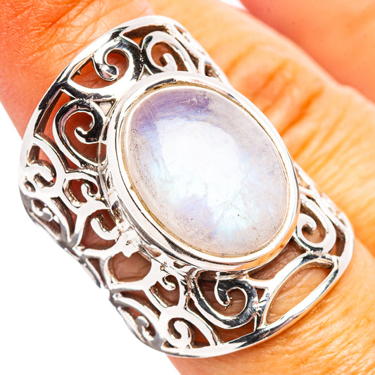 Oval iridescent moonstone set in ornate filigree sterling silver ring