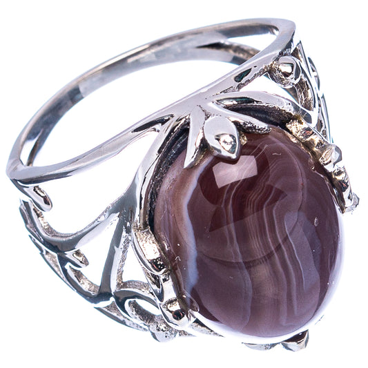 Dark oval agate cabochon sterling silver ring with openwork scroll design