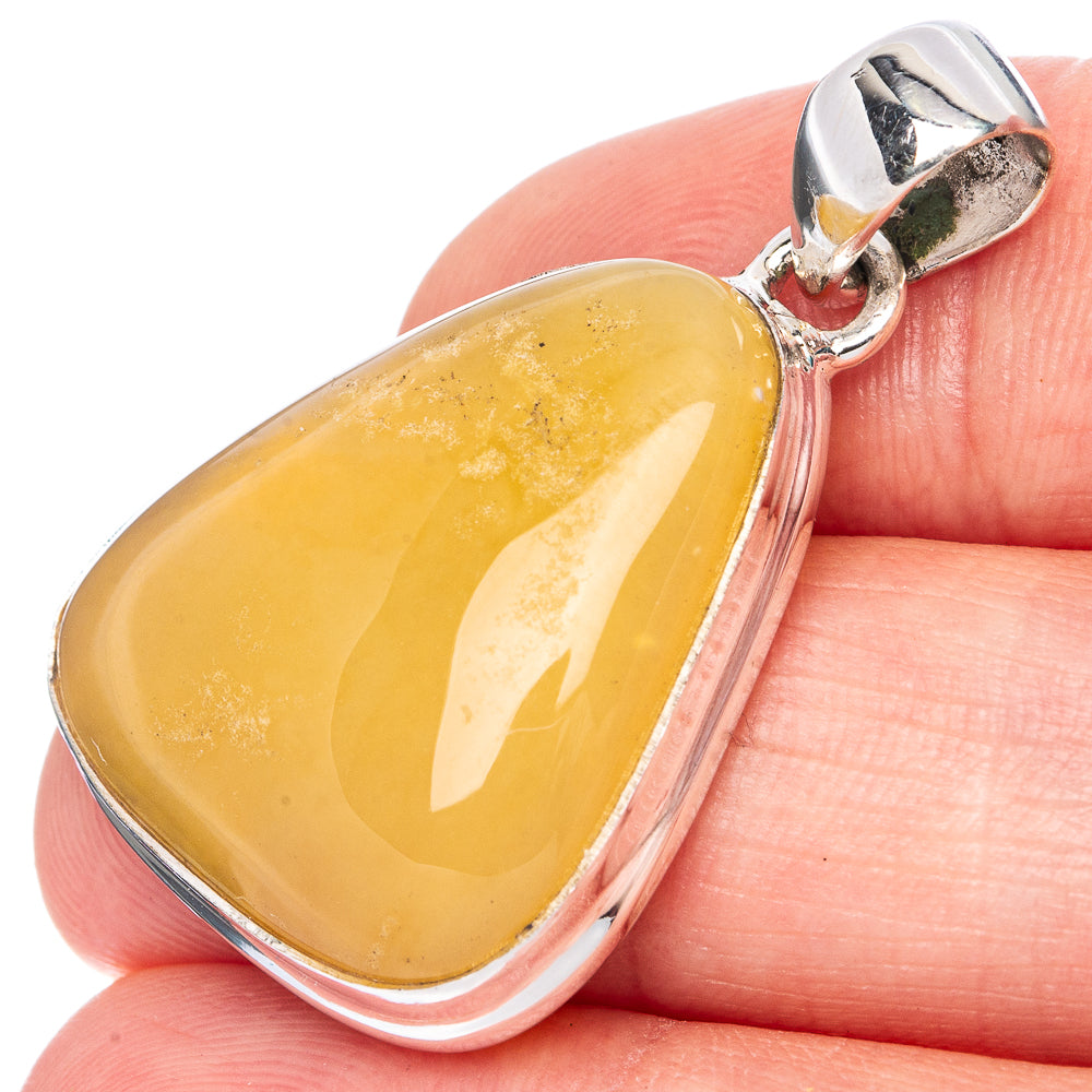 Sterling silver amber pendant with teardrop yellow amber cabochon