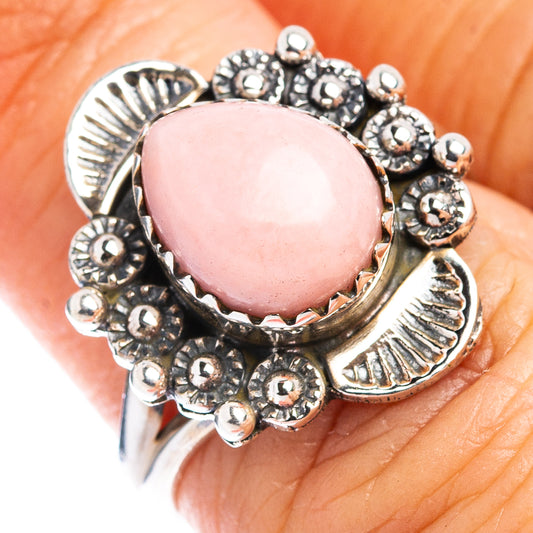 Pink oval opal ring with sterling silver beadwork and feather accents, size 6.25