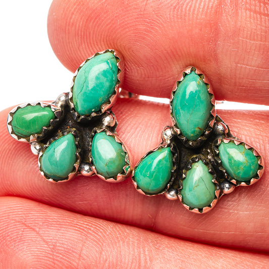 Cluster earrings with oval turquoise stones in dark silver bezel setting