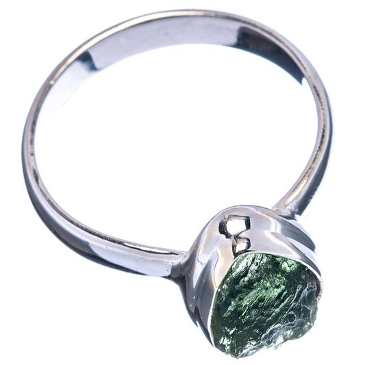 Sterling silver ring with green moldavite teardrop bezel on size 9 band