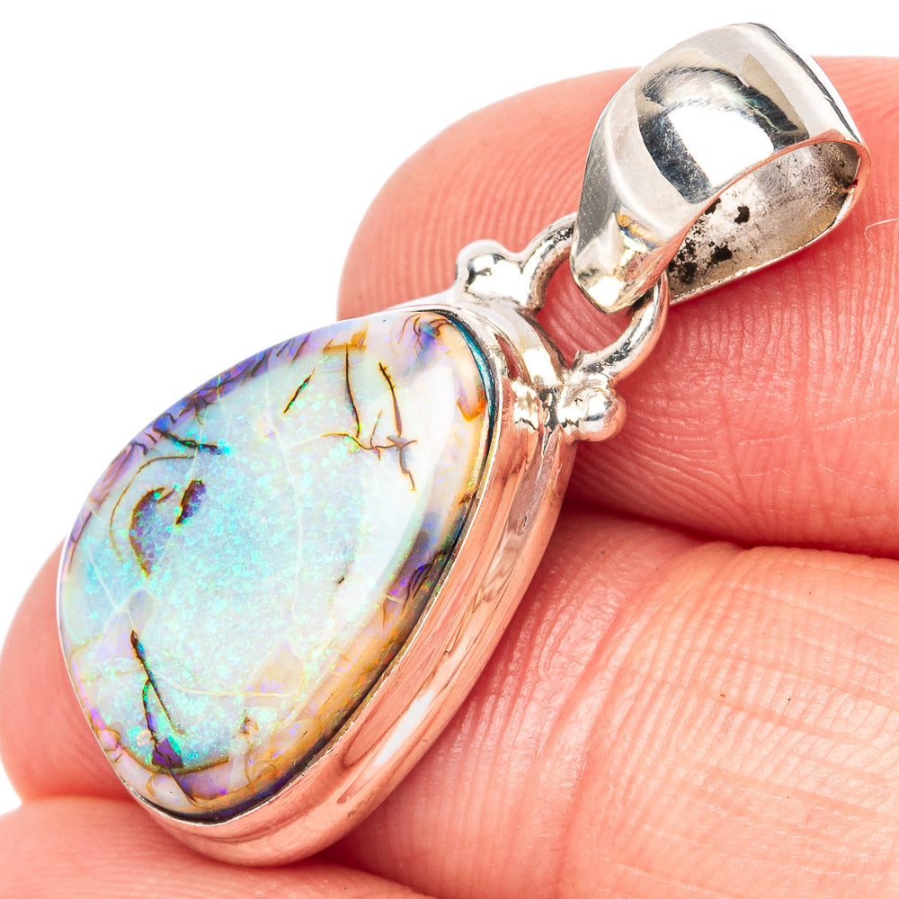 Oval opal pendant in 925 sterling silver, textured bezel and loop bail