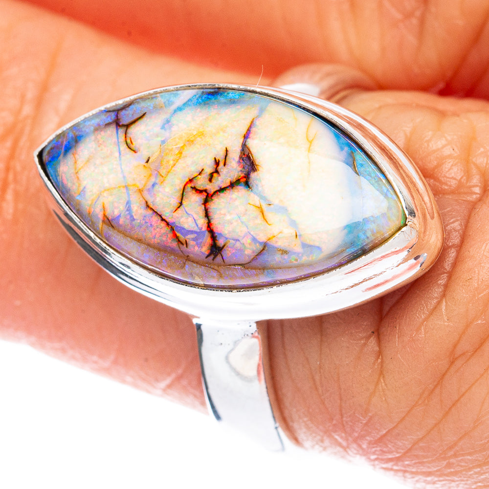 Sterling silver opal ring with oval multicolor iridescent stone, top view