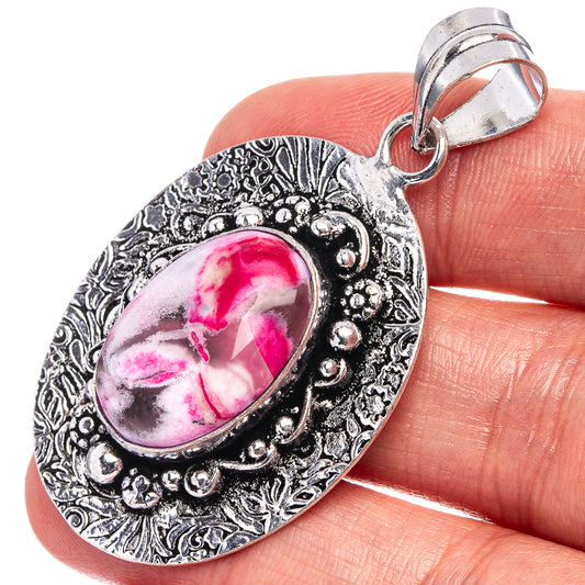 German silver pendant with pink oval dendritic opal and ornate bezel, with bail