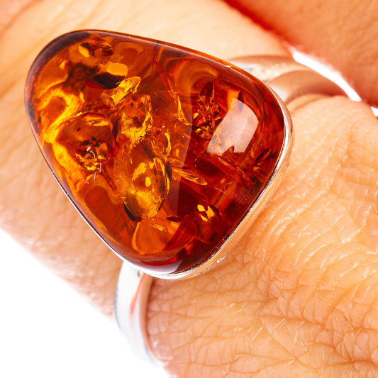 Amber heart ring with .925 sterling silver band and glossy amber setting