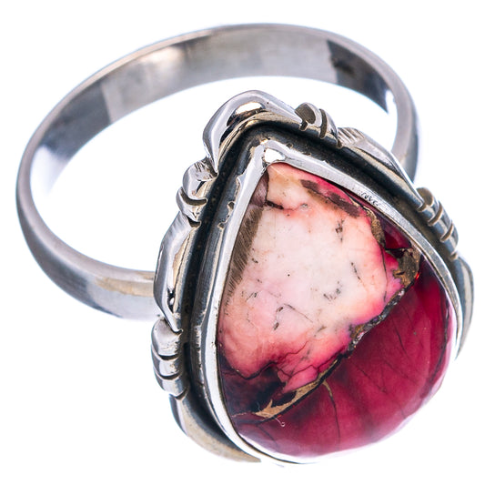 Sterling silver ring featuring red-pink marbled oval stone, side prongs and bezel