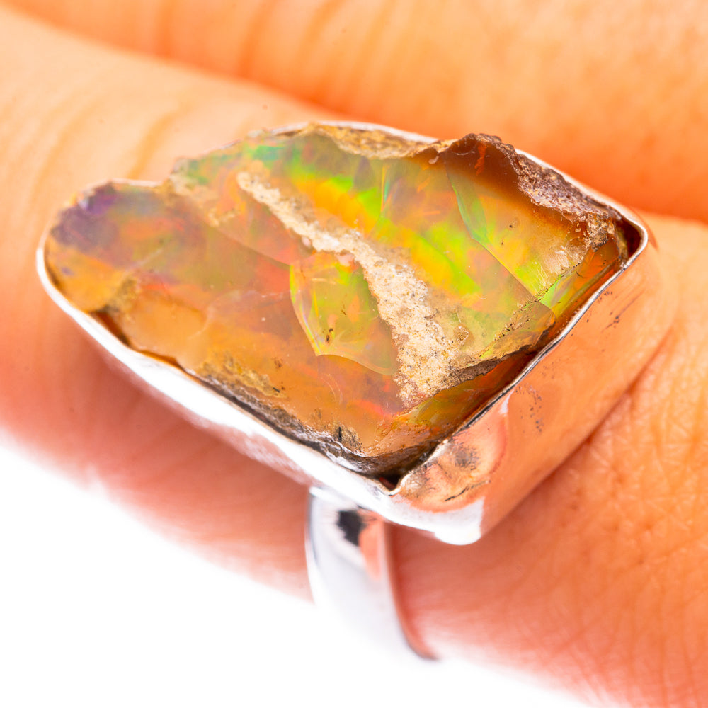 Raw Ethiopian opal ring, sterling silver with iridescent orange-yellow stone