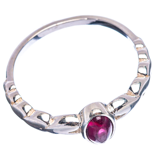Sterling silver garnet ring with round oval ruby-red stone, openwork band