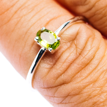 Sterling silver stackable ring with oval peridot gemstone in green